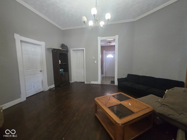 living area featuring baseboards, dark wood finished floors, and crown molding