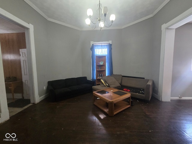 living area featuring dark wood-style floors, a notable chandelier, baseboards, and crown molding