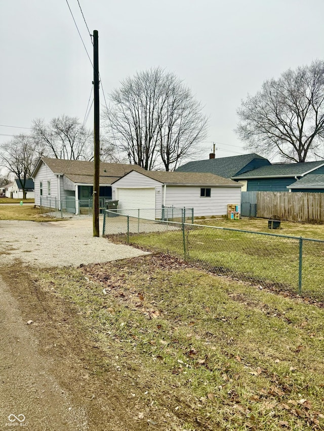 view of yard with a garage