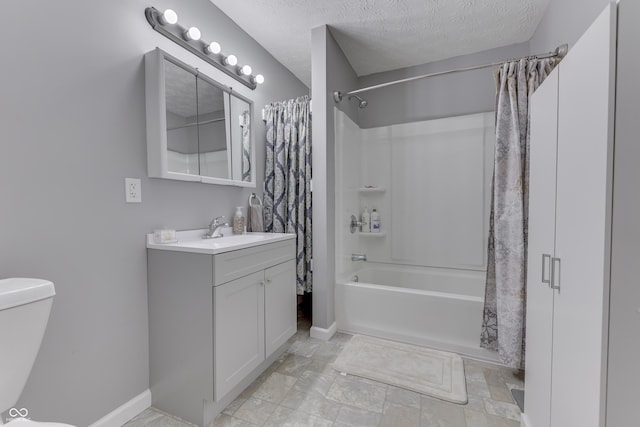 full bathroom featuring toilet, vanity, shower / bathtub combination with curtain, and a textured ceiling