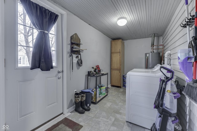 washroom featuring wood ceiling, cabinets, and gas water heater