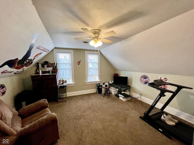 workout room with ceiling fan, lofted ceiling, and carpet flooring