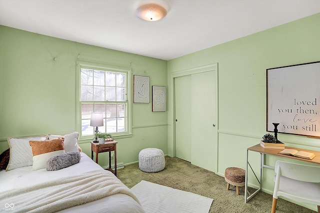 bedroom with carpet and a closet