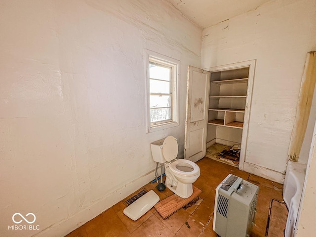 bathroom featuring toilet