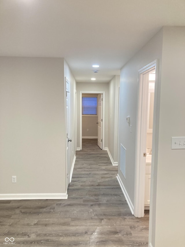 hall featuring dark hardwood / wood-style floors