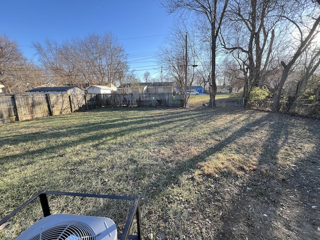 view of yard with central AC unit