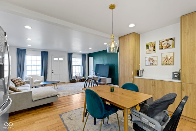 dining room with light hardwood / wood-style floors