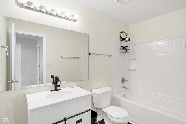 full bathroom featuring toilet, vanity, and  shower combination