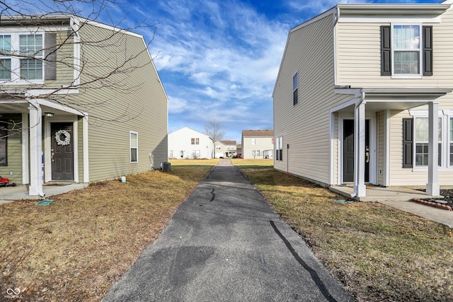 view of home's exterior featuring a yard