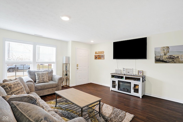 living room with dark wood-type flooring