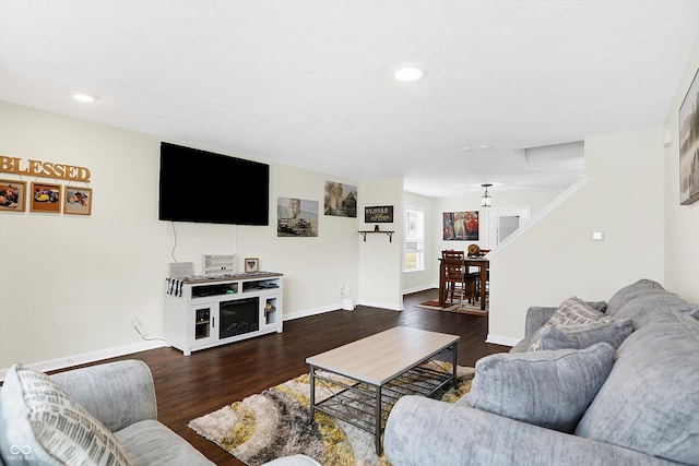 living room featuring dark hardwood / wood-style flooring