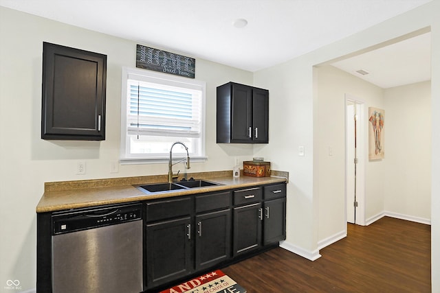 kitchen with dark hardwood / wood-style floors, dishwasher, and sink