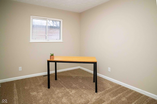 view of carpeted office space