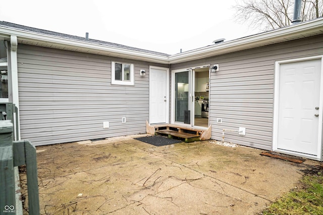 property entrance with a patio