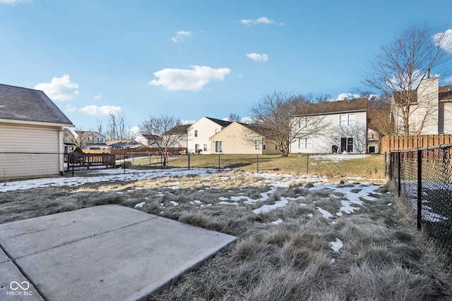 view of yard covered in snow