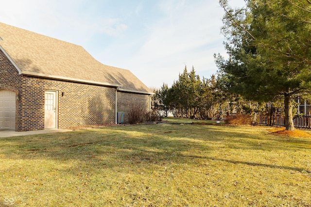 view of yard with a garage