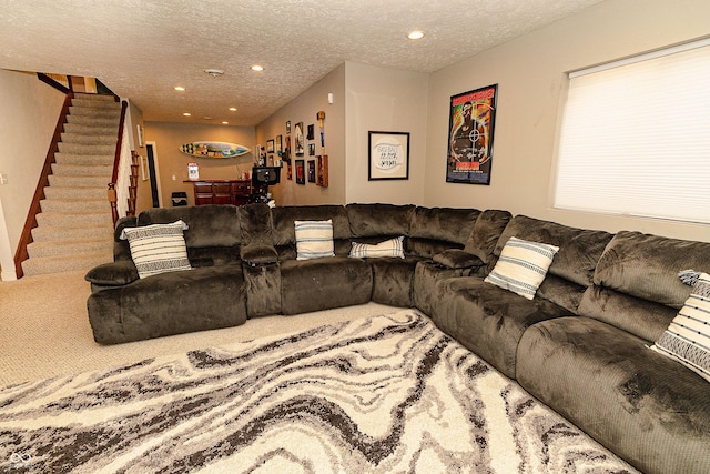 living room with a textured ceiling