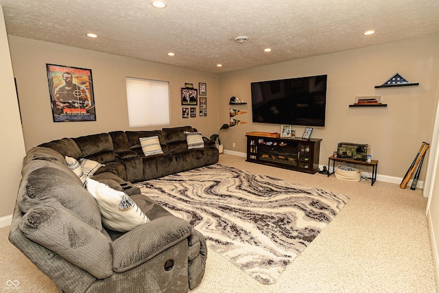 living room with a textured ceiling and carpet