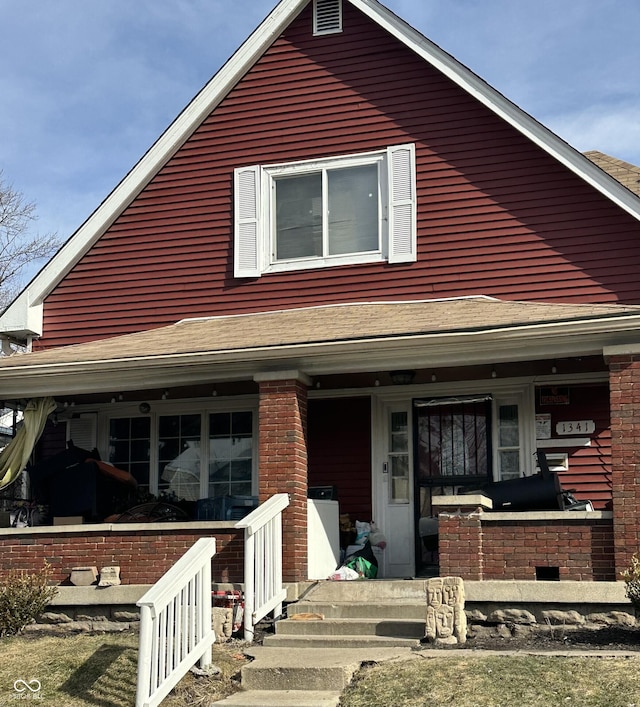 1341 N Dearborn St, Indianapolis, IN 46201 - view of front of property with a porch