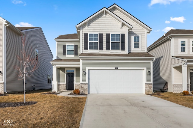 view of front facade with a garage and a front yard