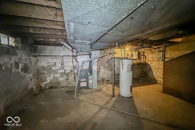 basement with electric water heater and heating unit