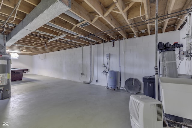 basement with sink and water heater