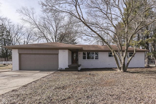 ranch-style house featuring a garage