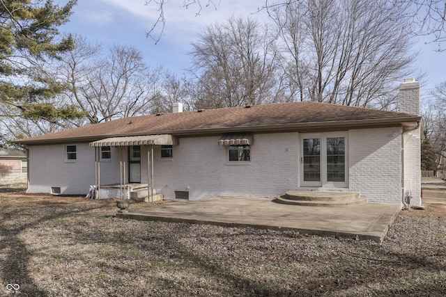 rear view of property with a patio area