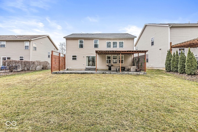 back of house featuring a yard and a patio area