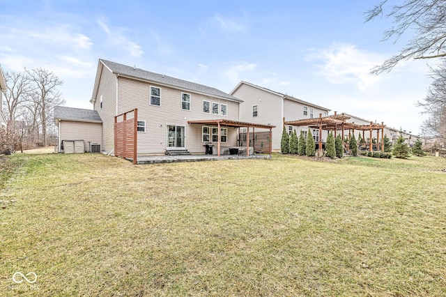 rear view of property with a pergola, a lawn, central AC, and a patio