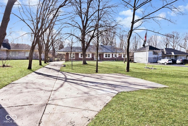 single story home with a front yard