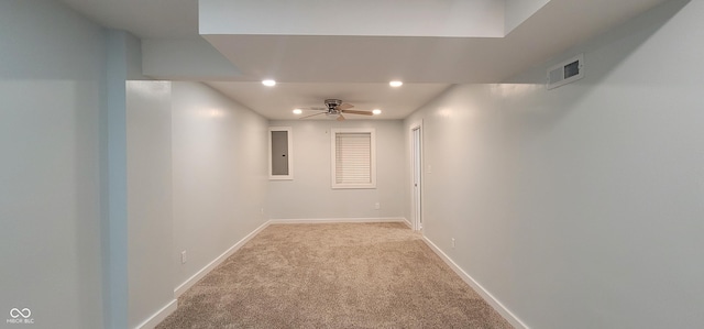 interior space featuring light colored carpet