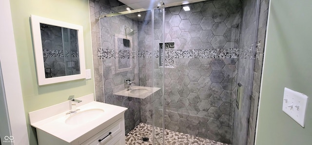 bathroom featuring vanity and walk in shower