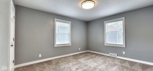 view of carpeted spare room