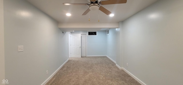 hall with light colored carpet