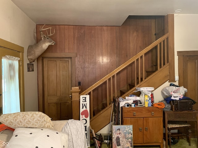 interior space featuring wood walls