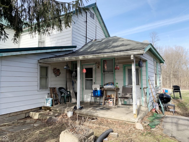 view of front of house with a porch and a patio area