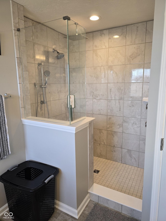 bathroom featuring tiled shower