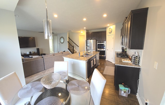 dining area with sink and dark hardwood / wood-style floors