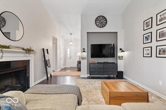 living room with dark wood-type flooring