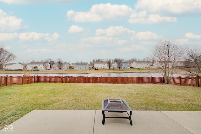 view of yard with a patio area and an outdoor fire pit