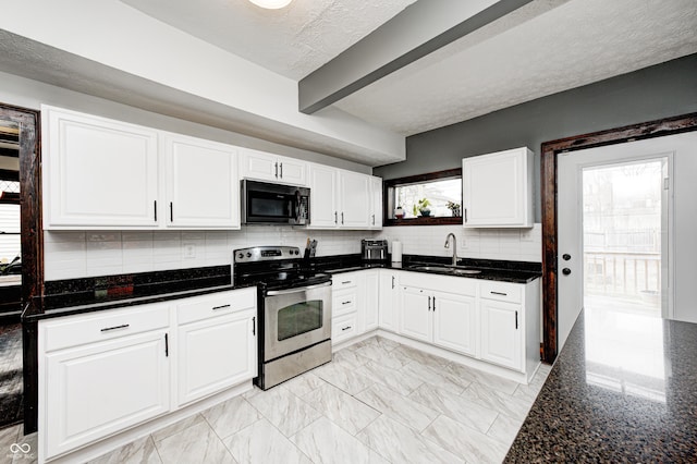 kitchen with white cabinetry, sink, decorative backsplash, dark stone counters, and electric range