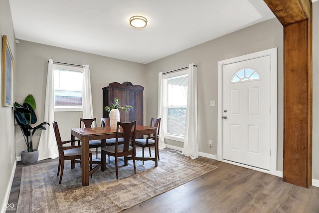 dining room featuring dark hardwood / wood-style flooring