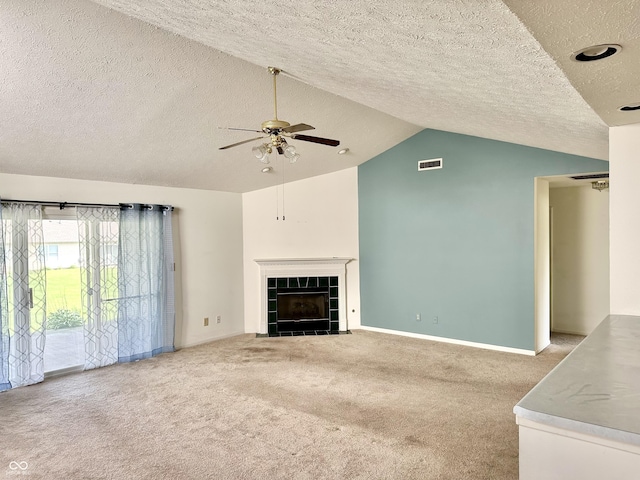 1348 Mccormicks Cir, Danville, IN 46122 - unfurnished living room with ceiling fan, lofted ceiling, a textured ceiling, carpet floors, and baseboards