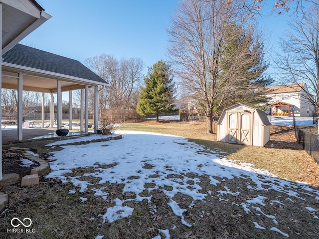 6264 Whitaker Farms Dr, Indianapolis, IN 46237 - snowy yard with a storage shed