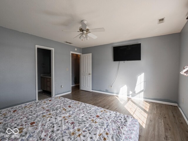 6264 Whitaker Farms Dr, Indianapolis, IN 46237 - unfurnished bedroom with ceiling fan, dark hardwood / wood-style floors, and ensuite bath