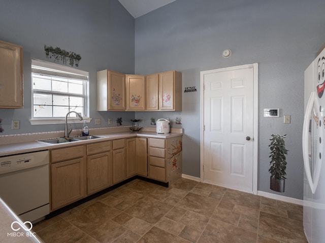 6264 Whitaker Farms Dr, Indianapolis, IN 46237 - kitchen featuring white appliances, light brown cabinetry, sink, and a towering ceiling