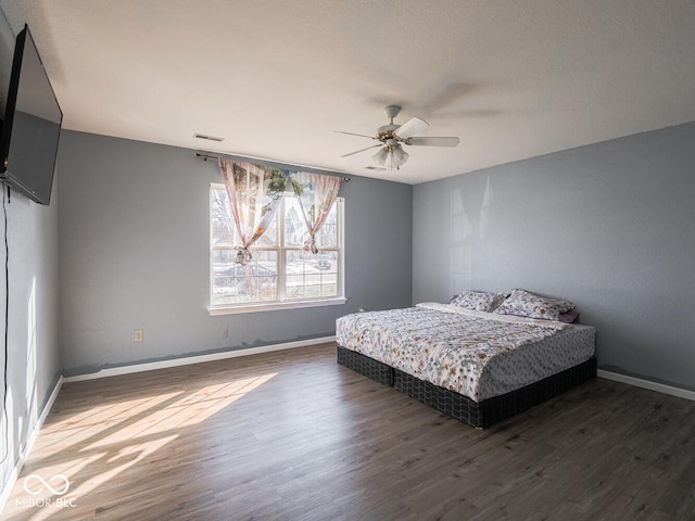 6264 Whitaker Farms Dr, Indianapolis, IN 46237 - bedroom featuring dark hardwood / wood-style floors and ceiling fan