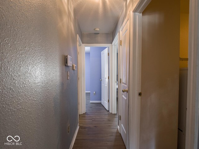 6264 Whitaker Farms Dr, Indianapolis, IN 46237 - corridor featuring dark wood-type flooring