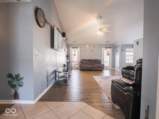 6264 Whitaker Farms Dr, Indianapolis, IN 46237 - living room featuring lofted ceiling, light hardwood / wood-style floors, and ceiling fan